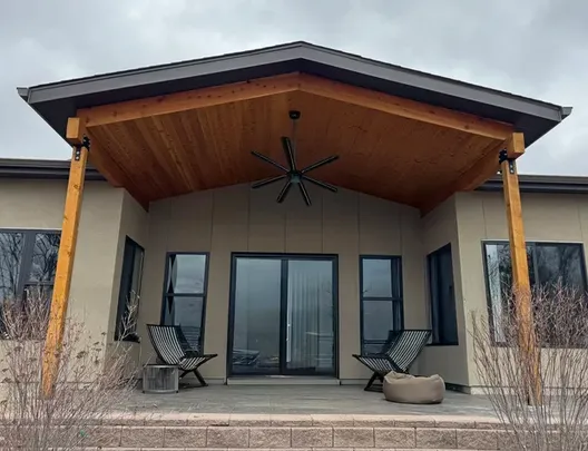 Completed patio project with a covered outdoor seating area